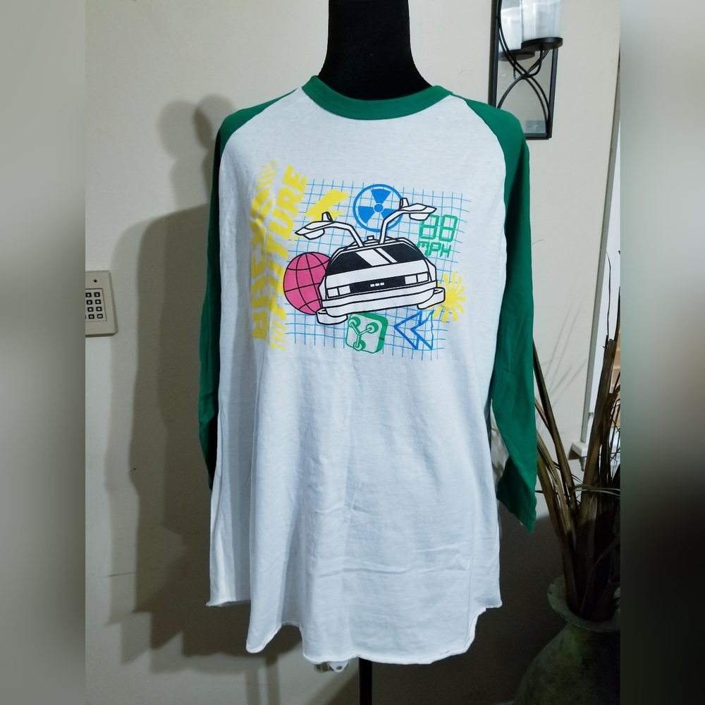 Universal White and Green Raglan Tee with Colorful Graphic